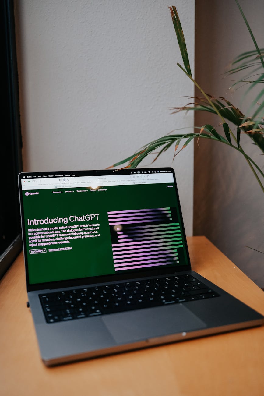 a laptop displaying chatgpt site